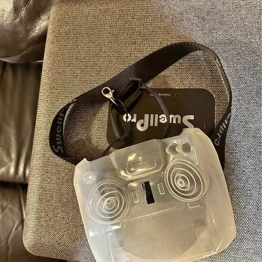 Drone parts: clear plastic controller shell with buttons and circular controls
