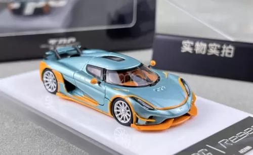Ice blue diecast racing sports car toy with orange accents, front three-quarter view