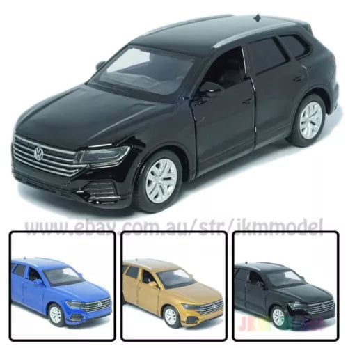 Dark gray VW Touareg diecast SUV model car, pull-back toy with detailed wheels