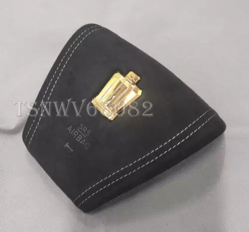 Black stitched mini car parts display case with gold clasp