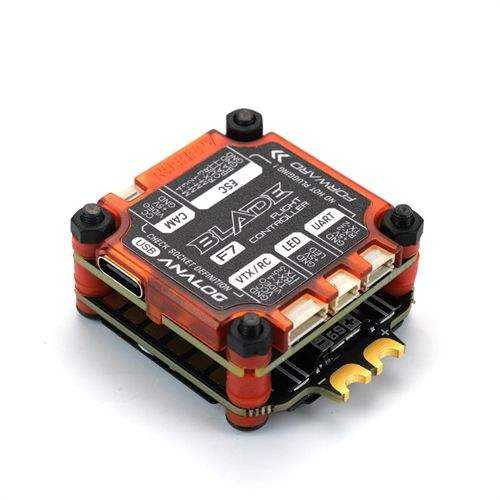 Analog flight controller PCB with mounting screws, orange-black board and pin connectors