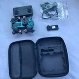 Quadcopter drone with teal body, remote controller, and open black carrying case