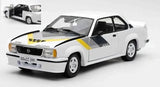 1:18 diecast coupe model car in white with black trim and yellow stripe decals