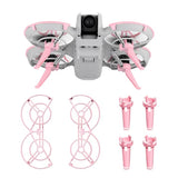 Drone propeller guard and landing gear extensions with pink guards and gray drone body