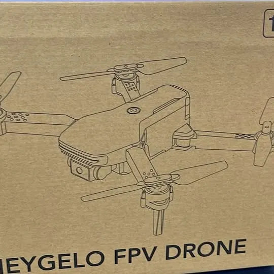 Quadcopter FPV drone with camera, shown with four rotating propellers