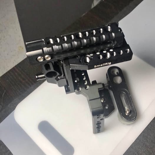 SmallRig GH5 camera cage with metal rails, side mounts, and accessory handle