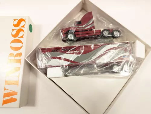 Red and white 1:64 diecast semi truck in clear retail packaging
