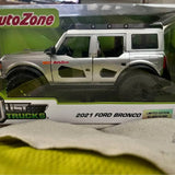 AutoZone diecast 2021 Ford Bronco model truck, silver body with green graphics