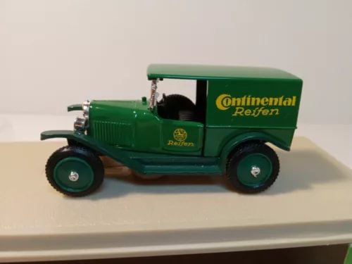Green 1:43 diecast delivery van with Continental Reifen side logo and open cab