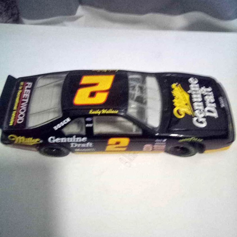 NASCAR diecast race car with #2 and yellow accents on black body