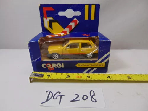 Vintage diecast toy car, yellow model in original blue box with window