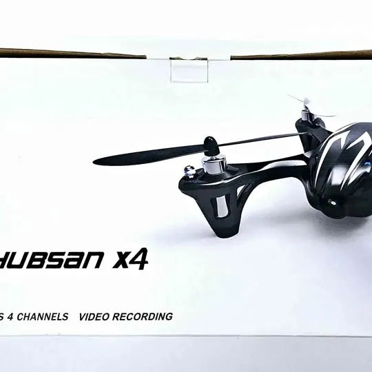 Hubsan X4 quadcopter drone with four propellers, black and silver body