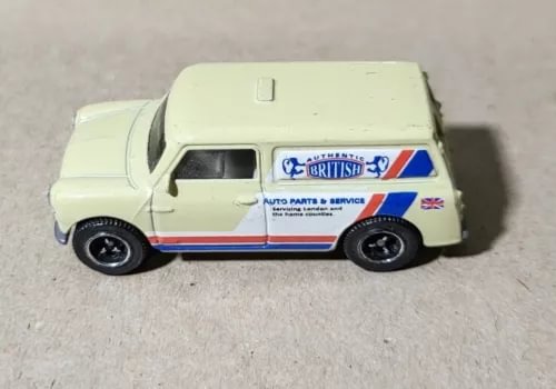 Cream diecast Austin Mini Van with British Auto Parts Service decals, black wheels