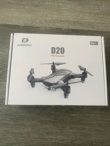 DEERC D20 HD camera drone product box with silver foldable quadcopter
