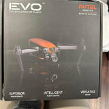 EVO drone box showing illustrated quadcopter with orange body and branding