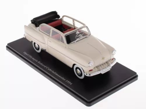 Cream convertible diecast car model on display base, whitewall tires, open top