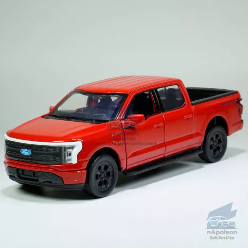 Red diecast pickup truck toy with black wheels, grille, and headlights