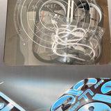 Blue stunt drone with black arms and prop guards in clear packaging