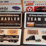 Racing collectible model cars in retail display boxes