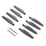 Drone propeller set with screws, dark gray blades and orange tips