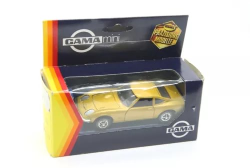 Yellow diecast car model in GAMA mini retail box with window