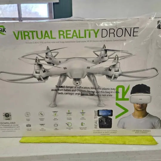 Virtual reality drone kit with illustrated quadcopter and VR headset on packaging