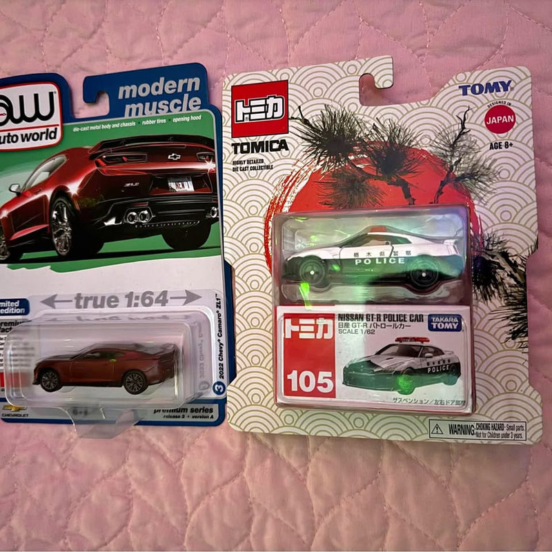 Tomica police diecast car set in blister retail packaging, red number 105