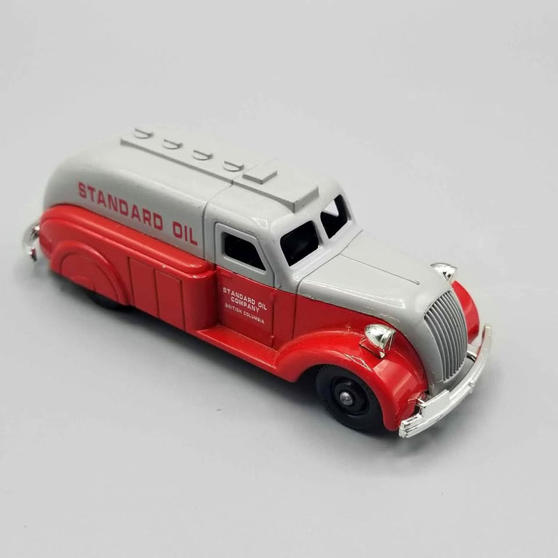 Die-cast truck model with gray cab and red body, front grille and chrome bumper