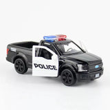 Police pickup diecast model car, front 3/4 view, door open, black and white