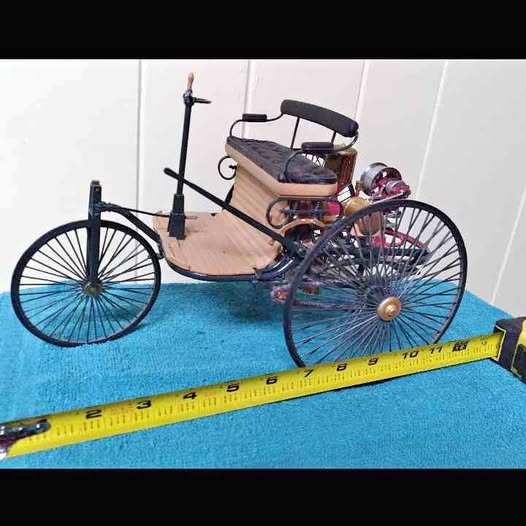 Classic car diecast alloy tricycle with dark seat and chrome frame, large spoked wheels
