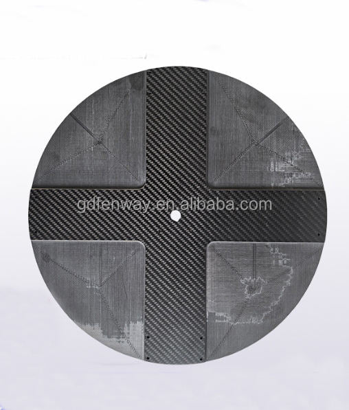 Carbon fiber circular component with four panel sections and dark weave pattern