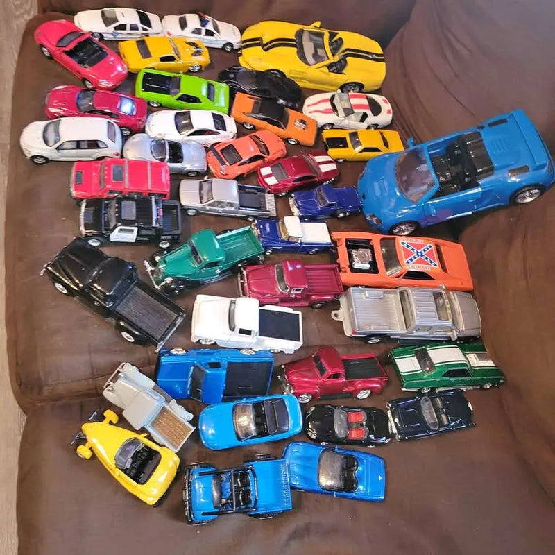 Diecast toy car collection with multiple colorful cars