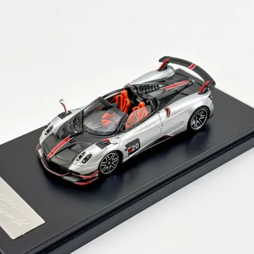 1:64 silver diecast roadster model with black hood, red accents, and #20