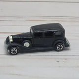 Hot Wheels 1:64 diecast classic Packard car, black, whitewall tires
