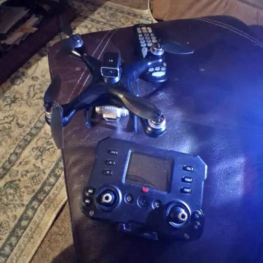 Brushless drone with 4K UHD camera, blue quadcopter with remote controller and display