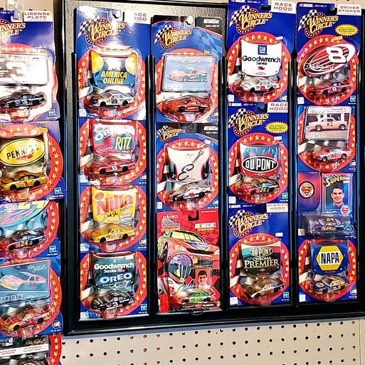 1/64 scale NASCAR diecast cars in multi-pack blister packaging with colorful labels
