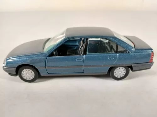 Blue 1:43 diecast sedan model car with opening doors and detailed wheels