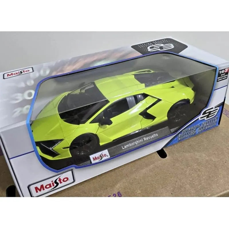 1:18 diecast model car in box, lime green with black aerodynamic details