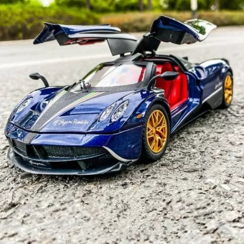 Racing blue diecast alloy model car with open doors, red interior, gold wheels