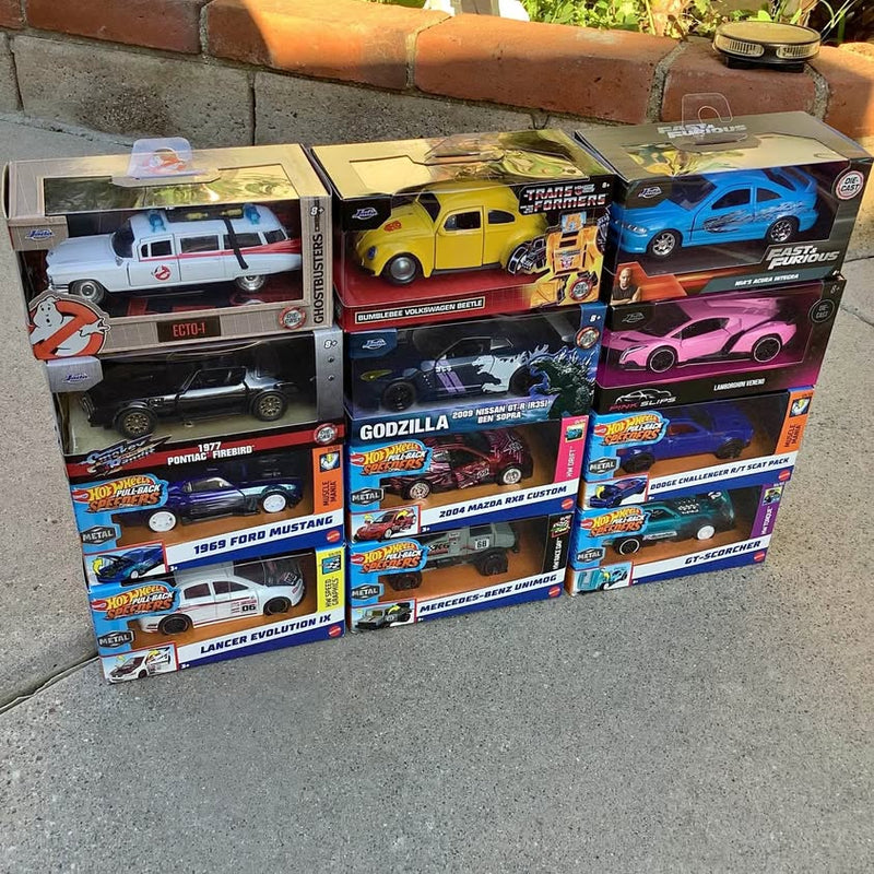 Hot Wheels diecast car boxed assortment with multiple 1:32 scale cars
