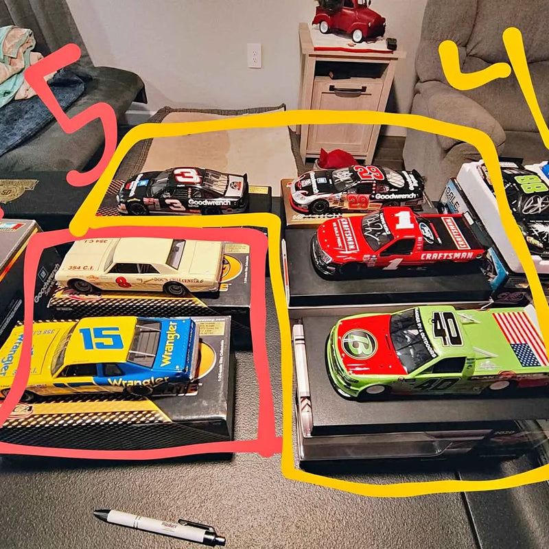 NASCAR diecast race car collection in boxed packaging, red, white, green and blue
