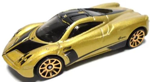Gold and black 1:64 diecast sports car with detailed wheels and windshield