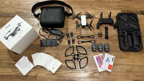 Drone accessory kit with storage case, propellers, batteries and tools