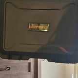Hard drone combo case interior panel with rectangular logo label