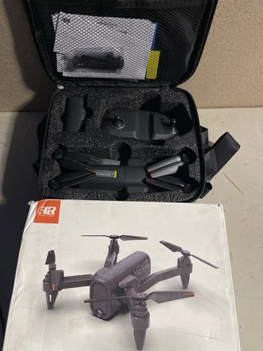 Foldable quadcopter drone with camera, in open hard case and box