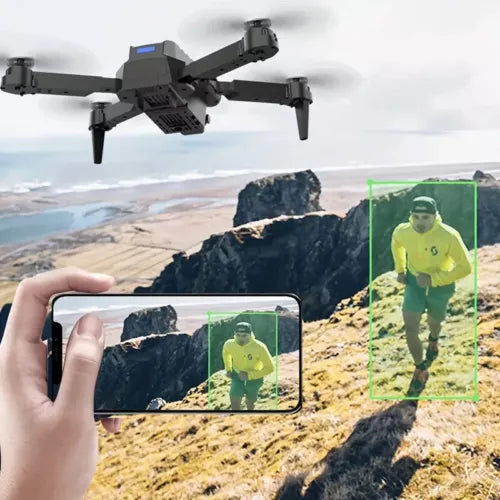 Foldable FPV quadcopter drone with phone showing live video view