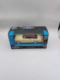 1/24 diecast convertible model car in box, cream body with maroon interior, blue accents