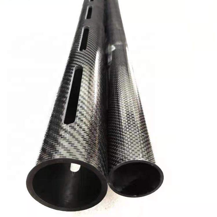3K carbon fiber tube pair with drilled slots and dark hollow ends