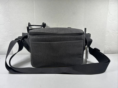 Black folding drone storage bag with shoulder strap and front pouch