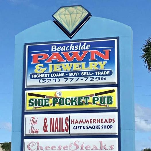 Diecast replica car front panel with sponsor decals, Pawny & Jewelry and Beachside Pawwn